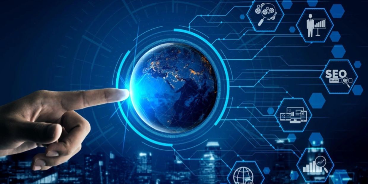 Blue digital image. Globe with glowing finger touching it. Icons of digital images overlaid. 