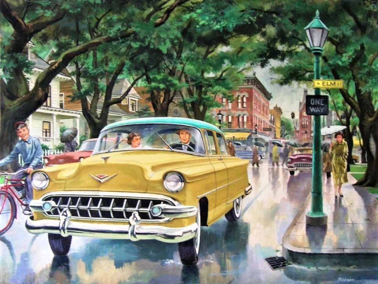 Vintage yellow car driving on a rainy Elm Street with people and cyclists around.