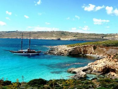 excursions in malta, boat trips, comino by boat, sailing trip, captain morgen, hera cruises, sunset
