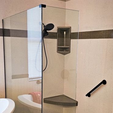 Fameless 3/8" shower Glass Enclosure With a custom Onyx base