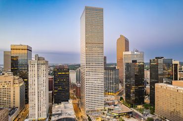 Drone twilight shot of the Republic Plaza Building in downtown Denver Colorado.