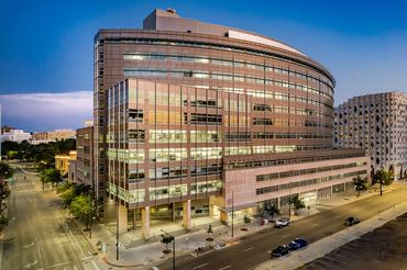 Drone twilight shot of the Wellington E Webb Municipal Office Building in downtown Denver Colorado.
