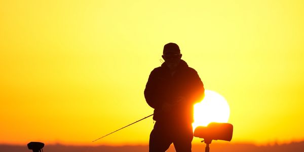 Dicky Newberry fishing photo with sunrise