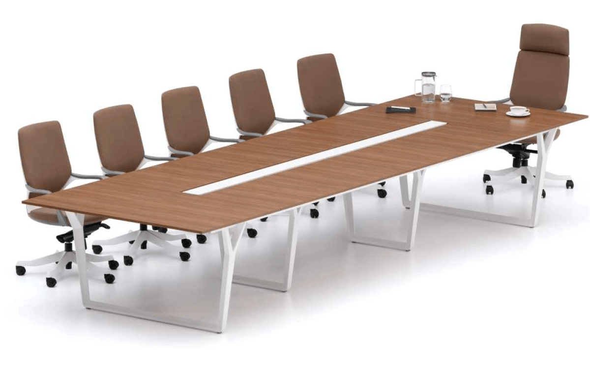 Modern office chairs around a wooden conference table with wheels.