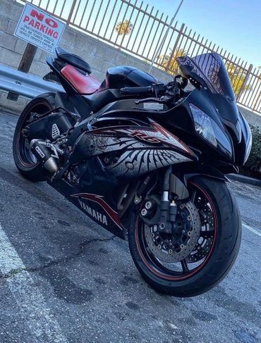 motorcycle front suspension lowering/limiter straps.