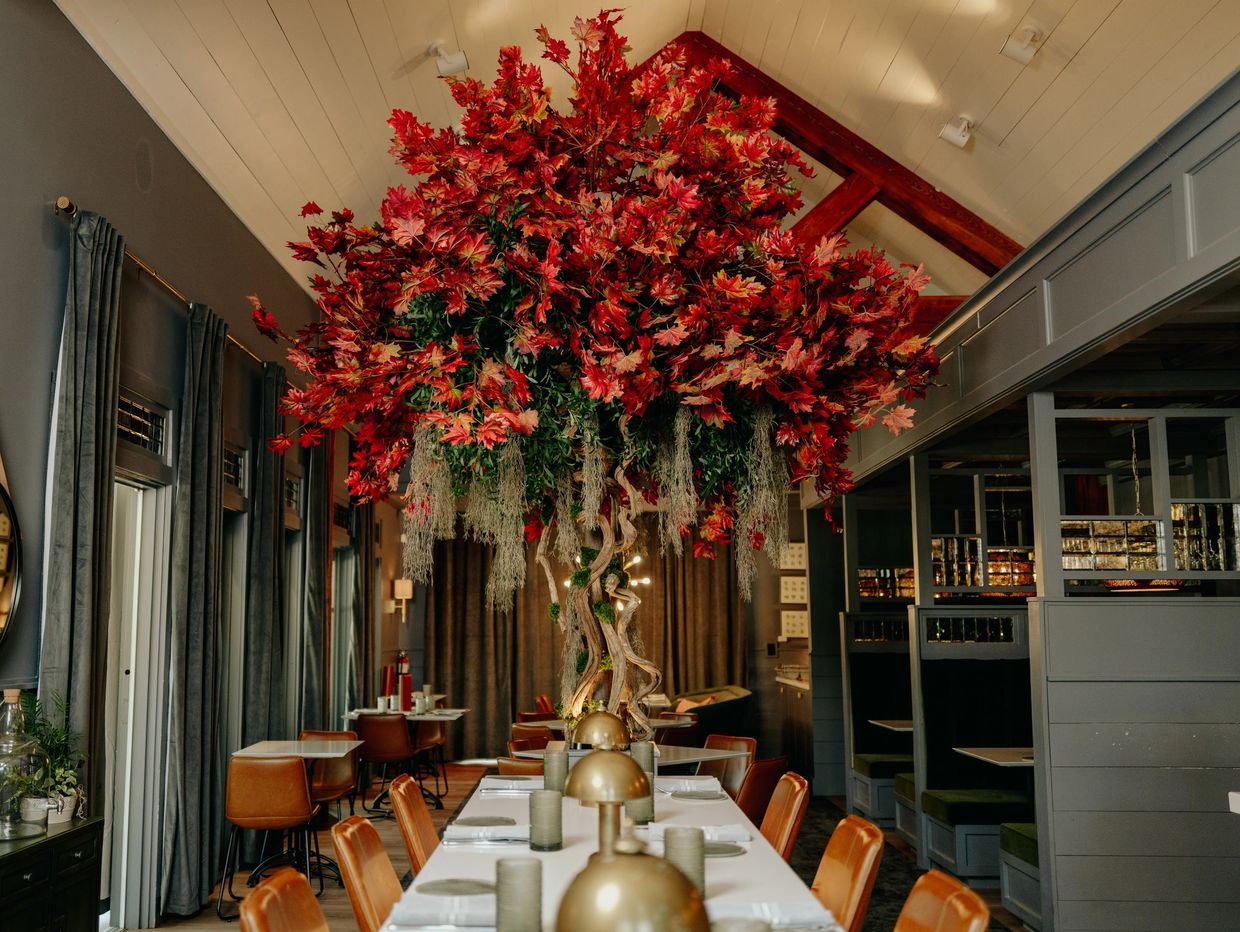 Fall tree in the center of the restaurant.