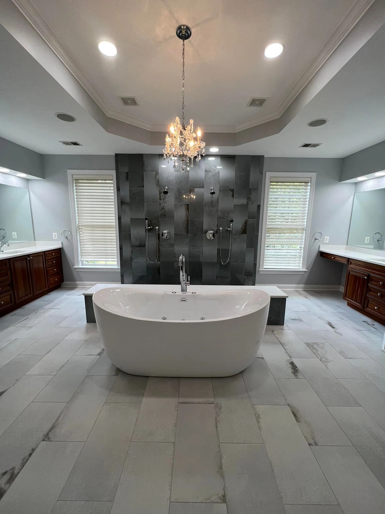 New bathroom renovation. Replaced all tile and vanities and fresh new coat of paint to upgrade look.