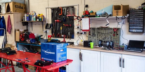 Mobility scooter repair shop tools and table