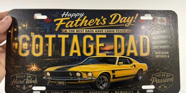 Father's Day license plate with classic car and cabin theme.