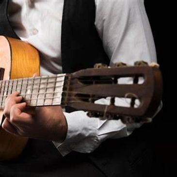 Guitarra y Organo y dos voces