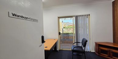 Office room with a chair and desk.