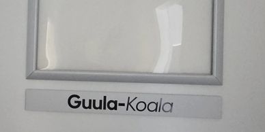 A sign reading 'Guula-Koala'.