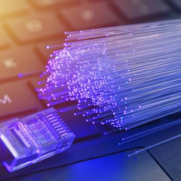 Fiber optic cables and an Ethernet connector on a keyboard.