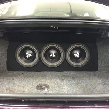 3-10" JL Audio subs in a Malibu