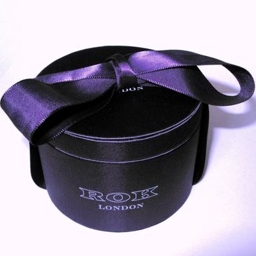 High quality multi purcpose jewellery box with tieable bow ribbon. Branded with the ROK London.& dom