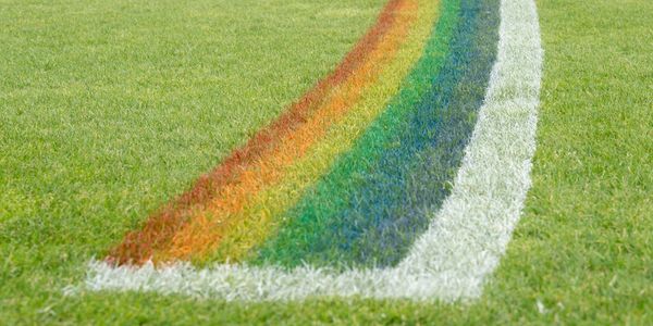 A rainbow painted on grass