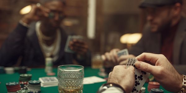 out of focus image of poker players