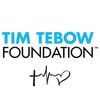 Tim Tebow Foundation logo with heartbeat and heart icons.