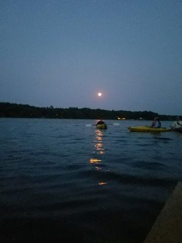 Northern Paddle Trail Moonlight paddle event on Squash Lake. September 2022