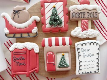 Festive Christmas-themed decorated cookies.
