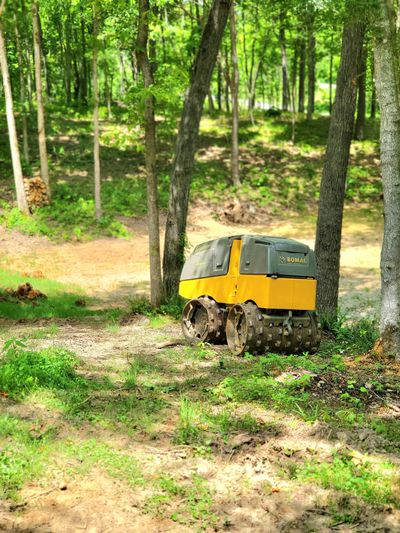 fine thread contracting compactor in the woods