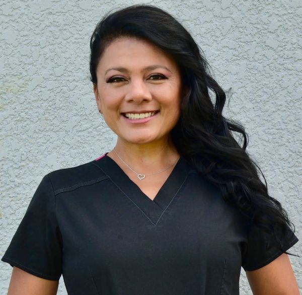 Mercidia Hendra - Licensed Massage Therapist and certified in Lymphatic Drainage.