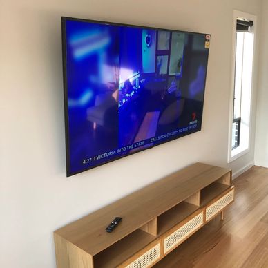 Television (TV) on wall 