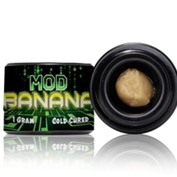 Container labeled 'Mod Banana' with a small amount of substance inside.