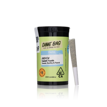 Pre-rolled joint next to a green Dime Bag container labeled 'Indica Sweet Tooth'.