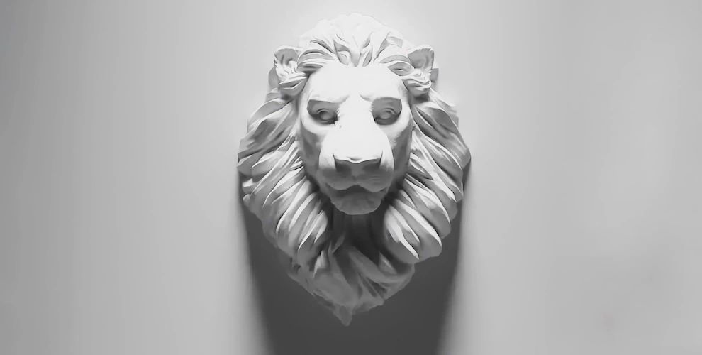 Michael Epstein entertainment attorney headshot with white lion graphic
