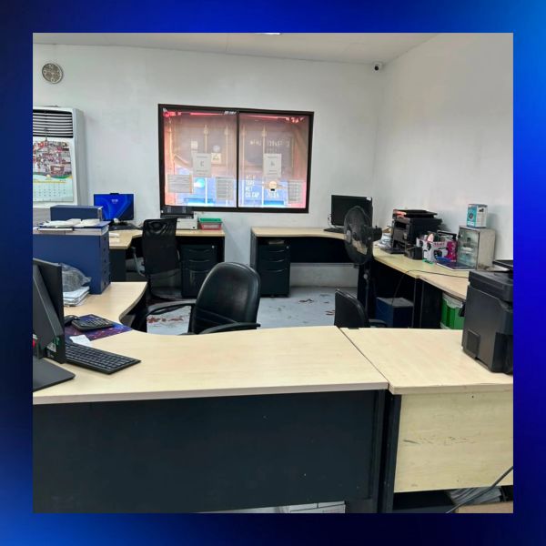 Empty office with desks and chairs.