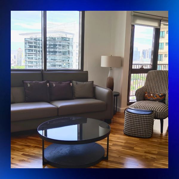 Modern living room with city views.