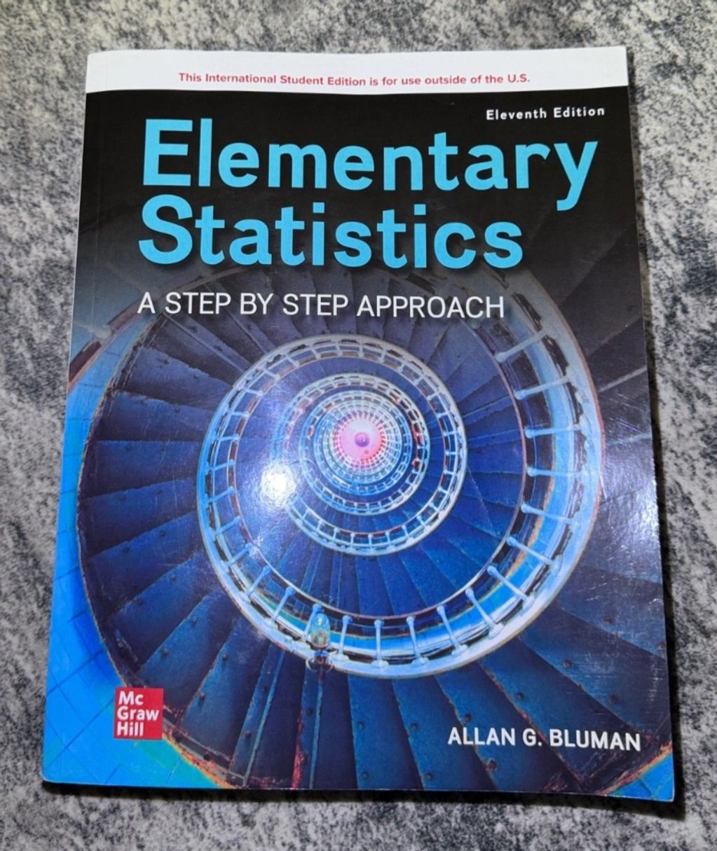 Cover of 'Elementary Statistics: A Step by Step Approach' textbook by Allan G. Bluman.