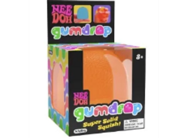 Gumdrop super solid squish toy in bright orange packaging.