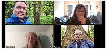 Video call with four participants in different locations.