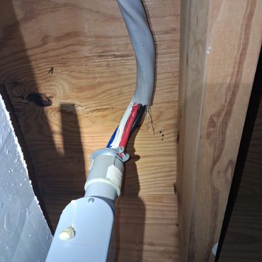 Damaged conduit & exposed wires in Linden. 