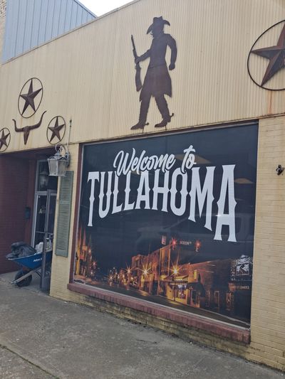 Welcome to Tullahoma sign and western silhouette art on a downtown building on North Jackson Street