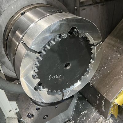 A lathe preparing a sprocket.  