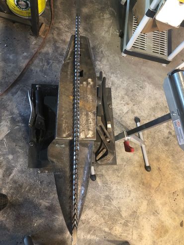 Custom made dragon scale fire poker