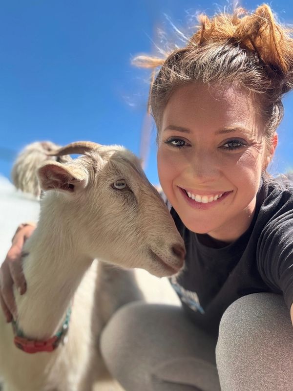 Manager with pet goat 