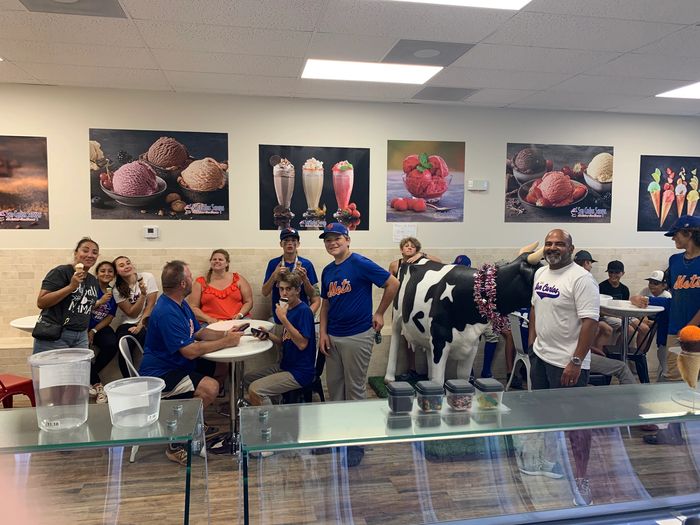 Group of Baseball Players, Coaches and Parents enjoying delicious Ice Cream at San Carlos Scoops