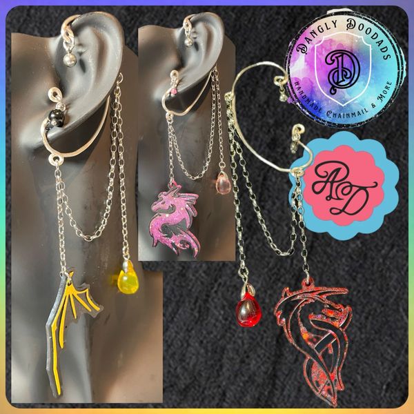 dangly doodads attire dolls dragon creator collaboration dangly earcuffs resin dragons resin wings 