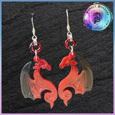 Handmade resin dragon earrings with anodised aluminium mobius detail & stainless steel hooks