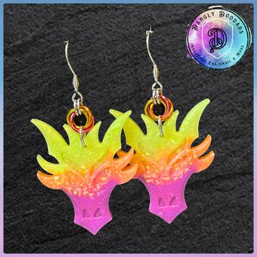 Handmade resin dragon earrings with anodised aluminium mobius detail & stainless steel hooks