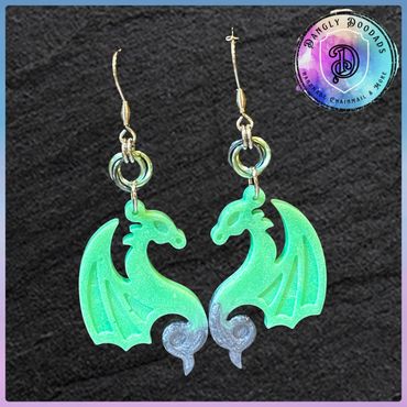 Handmade resin dragon earrings with anodised aluminium mobius detail & stainless steel hooks