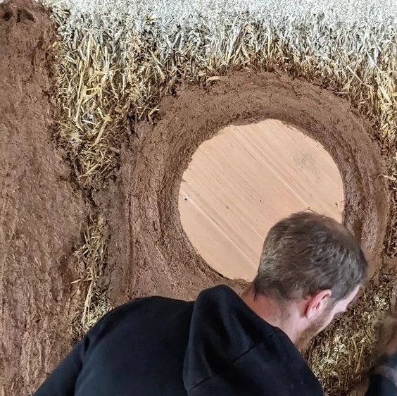 Clay Plaster on sustainable strawbale eco home