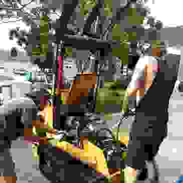 mechanics working on excavator