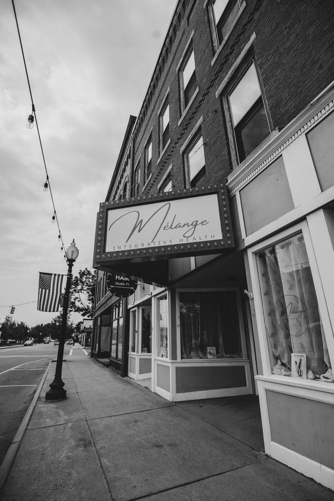 Front of office sign above door on MainStreet in downtown Rochester NH