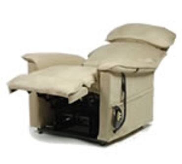 Beige recliner chair with extended footrest and cushioned backrest.
