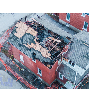 Fire Damaged house with half the roof burnt.  Drone aerial Services, kitchener waterloo guelph